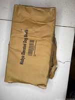 Outer cardboard box printed with 'Nuibya Elevated Dog Bowls' and barcode