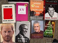 Eight of the books laid out showing covers