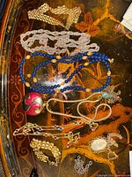 All necklaces laid out showing variety and key features