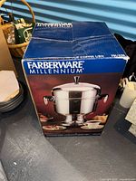 Retail box showing Farberware Millennium coffee urn image and branding