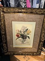 Full view of framed floral print showing frame, mat, and artwork