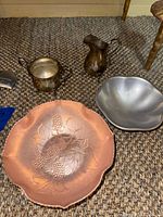 All four items grouped: pitcher, sugar bowl, copper plate, gray bowl