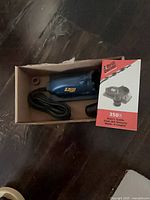 Drill Doctor 350X sharpener in cardboard carton with retail card