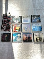 All 14 CD jewel cases front view