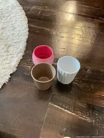 All three pots grouped on floor