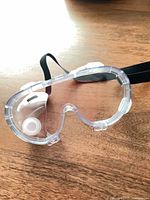 Example goggle out of packaging showing clear lens, vent and strap