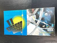 Front covers of both LPs side by side