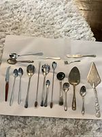 Full layout of 16 assorted pieces on white background