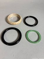 Group shot of four bangles laid flat