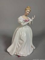 Front three-quarter view of entire figurine