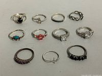 Group shot of nine assorted sterling silver rings