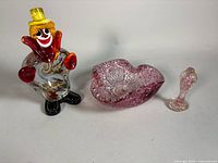 Group shot showing clown figurine, amethyst bowl, small matching piece