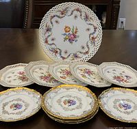 Group photo showing all eleven plates