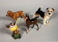 Group shot of four porcelain animal figurines
