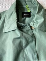 Collar and Akris label