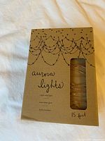 Front of boxed Anthropologie aurora lights showing design, length and features