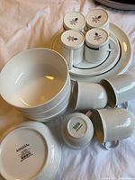 Assortment of bowls, mugs, cups and plates showing quantity and backstamps