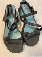 Top view of pair showing straps, footbed colour and general condition