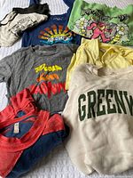 All seven tops laid out together