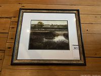 Full view of framed watercolor painting with mat and frame