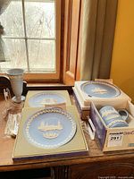 Overall view showing boxed mug and plate plus bud vase