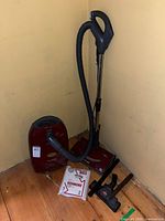 Full lot: canister vacuum, hose, power nozzle, bag pack, accessories