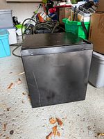 Front view of Hisense compact refrigerator showing overall size, color and logo