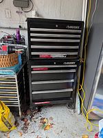 Front view of Husky two-piece rolling tool cabinet showing drawers and casters