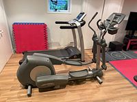 Life Fitness Club Series elliptical full side view in workout room