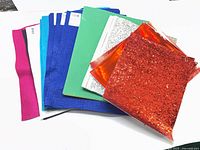 Stack of assorted felt, EVA foam and glitter sheets