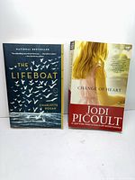 Front covers of both paperback novels