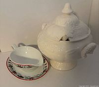 Tureen with lid and gravy boat on underplate
