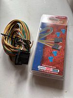 Packaged Draw-Tite/Hidden Hitch/Reese wiring harness and loose harness