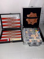 Both game sets open showing contents