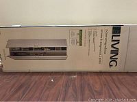 Photo of the For Living storage cabinet box showing brand, 2-door model with 5 shelves and dimension info.