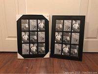 Photo of two black wall hanging picture frames each containing 9 black and white photos of children and a dog, standing on a wooden floor against a closed white door.