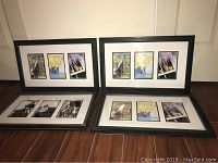 Four forest green wooden picture frames each containing three 4x6 photos, arranged on a wooden floor.