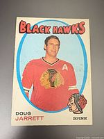 Full front view of card showing player image and team header