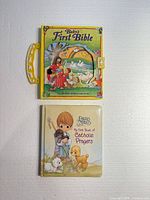 Front covers of two children's religious books