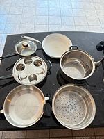 Group view of cookware pieces on countertop