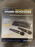 Front of box showing Quantum FX M336 twin-pack wireless dynamic microphones and receiver