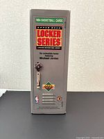 Front view of grey locker-shaped box showing NBA Locker Series logo and Series 3 indicator