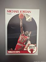 Front of Michael Jordan NBA Hoops card in dunk pose