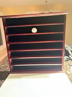 Front view showing shelves and overall structure