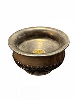 Cup side view showing stone body and silver rim