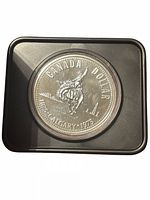Reverse of 1975 Calgary Centennial Canadian dollar in capsule