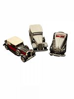 Front three-quarter view of all three cars