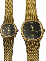 Front view of both watches displaying dial and bracelet design