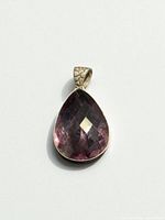Front view of pear-shaped amethyst sterling silver pendant