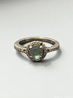 Top view showing aquamarine center stone and halo setting